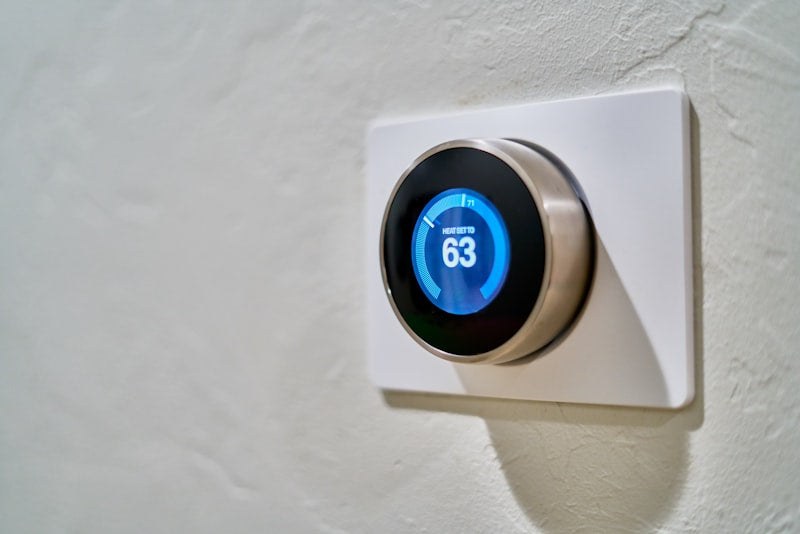 Smart thermostat display on wall